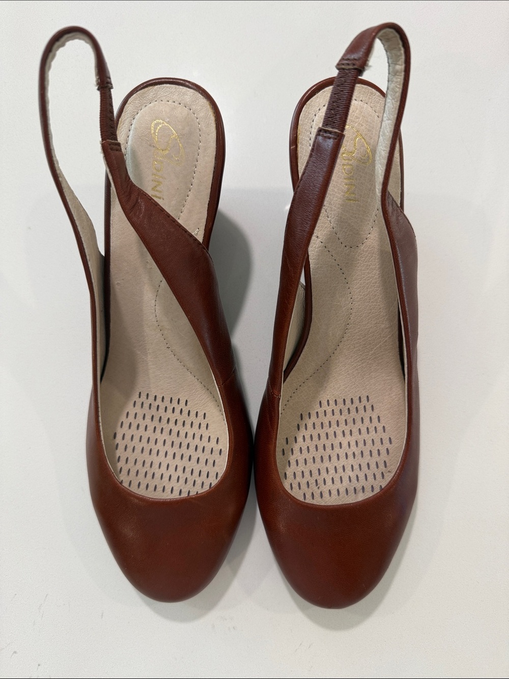 Sudini Brown Slingback Wedge Pumps